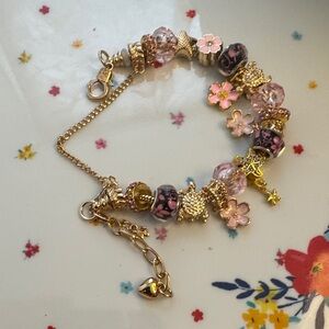 Fashion Jewelry Gold and Pink Floral Charm Bracelet
